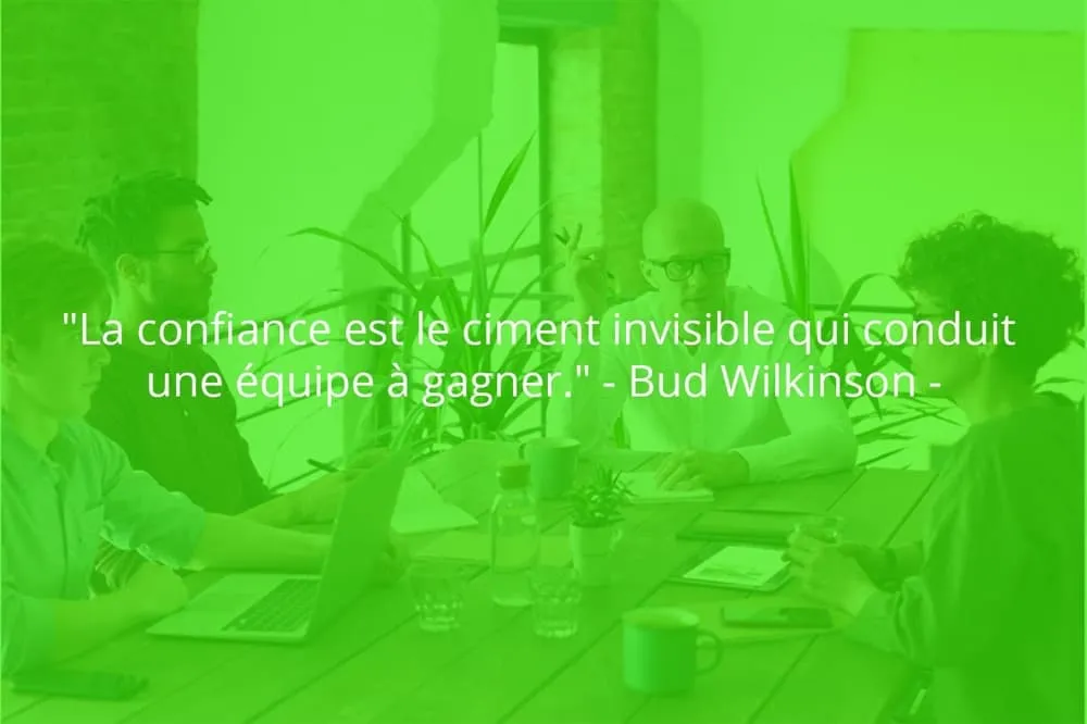 Citation de Bud Wilkinson sur le travail d'équipe et la confiance.